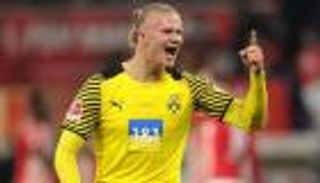 "ملك البطولات" يحرض برشلونة ضد هالاند