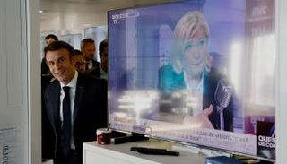 ماكرون وفي التلفزيون لوبان