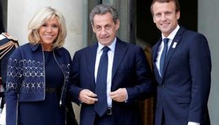ساركوزي مع ماكرون وعقيلته بيرجيت- أرشيفية