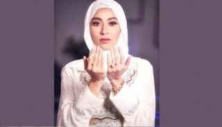 زيزي عادل تعتزل الغناء والفن 