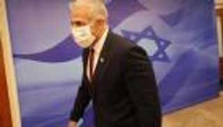 لابيد: سنحافظ على الوضع الراهن للمسجد الأقصى