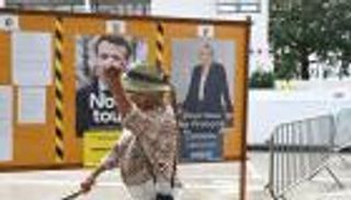 يوم الحسم.. كيف يعيش ماكرون ولوبان اللحظات الصعبة؟