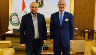 حسين العنكوشي ورئيس الاتحاد العراقي