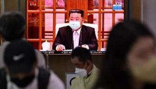 زعيم كوريا الشمالية مرتديا كمامة طبية