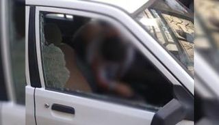 الضابط الإيراني مقتولا في سيارته في طهران