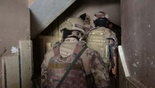 قوات الأمن التركية خلال إحدى المداهمات