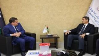 الدبيبة وعماد السايح رئيس مفوضية الانتخابات - أرشيفية
