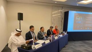 جانب من ندوة عالم ما بعد 2020 في معرض أبوظبي للكتاب