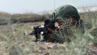 جندي تركي أثناء مشاركته بإحدى العمليات