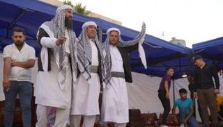 عرض فلكلوري في مهرجان تراث الموصل