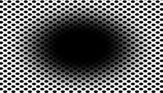 صورة ثقب أسود على خلفية من النقاط السوداء