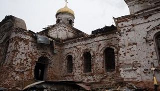 منظر خارجي لكنيسة مدمرة في قرية لوكاشيفكا بأوكرانيا - سي إن إن