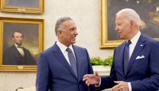 جو بايدن ومصطفى الكاظمي في لقاء سابق