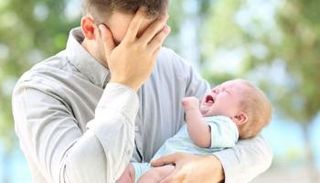 اكتئاب ما بعد الولادة عند الرجال