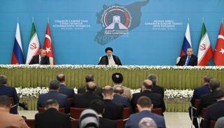 جانب من المؤتمر الصحفي لرؤساء روسيا بوتين وإيران رئيسي وتركيا أردوغان