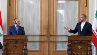 وزير الخارجية السوري فيصل المقداد ونظيره الإيراني 