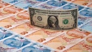 عملات من الليرة التركية والدولار الأمريكي