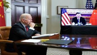 بايدن وشي في لقاء سابق