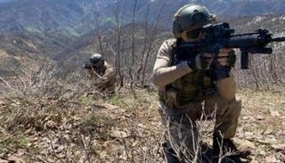 جنديان تركيا مشاركان بإحدى العمليات 