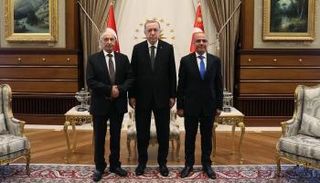 الرئيس التركي ورئيسا برلماني تركيا وليبيا