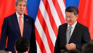 جون كيري خلال لقاء سابق مع الرئيس الصيني - أرشيفية