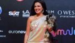 دارين حداد تستعيد ذكرياتها في فينسيا بإطلالة صيفية جريئة