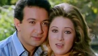 نور الشريف مع الفنانة بوسي