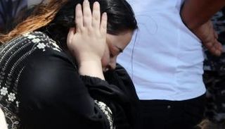 سيدة من أسر ضحايا حريق كنيسة إمبابة