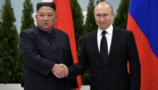 لقاء سابق بين بوتين وكيم