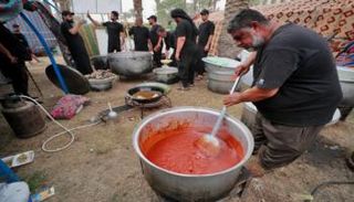 جانب من إعداد الوجبات في اعتصامي بغداد