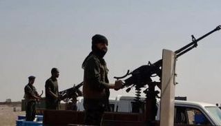 جنود أمن في حاجز أمني بالساحل الغربي لليمن- أرشيفية