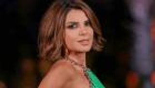 نوال بري تنشر صورة جديدة بالمايوه.. وتخطف الأنظار بفستان أسود