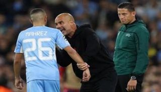 رياض محرز لاعب مانشستر سيتي ومدربه جوارديولا