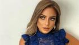 ريم البارودي بعد "المايوه الموف".. إطلالة مثيرة بـ بيجامة سوداء (صورة)