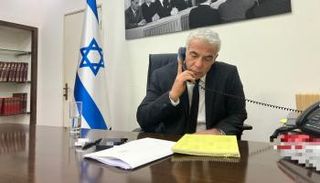 لابيد خلال الاتصال مع بايدن