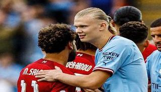 محمد صلاح وإيرلينج هالاند