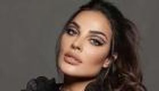 قبلات وأحضان.. نادين نجيم تحتفل بعيد ميلاد ابنها بـ"المايوه" (صور)