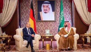 المستشار الألماني مع ولي العهد السعودي