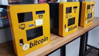 ماكينات ATM لصرف العملات الرقمية