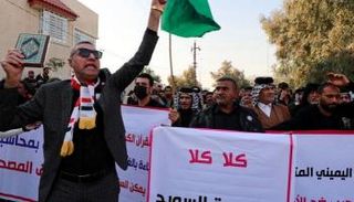 مطاهرات سابقة في العراق احتجاجا على حرق المصحف - رويترز