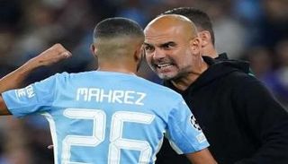 رياض محرز وبيب جوارديولا في مانشستر سيتي
