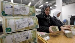 بعض فئات العملة السورية - أرشيفية