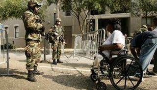 متحدي الإعاقة الناجين من الكوارث المناخية