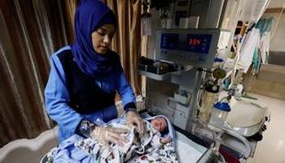 السيدة الفلسطينية سماح قشطة - رويترز