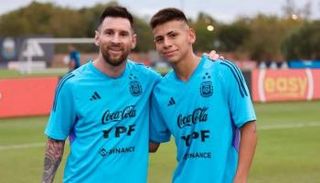 كلاوديو إتشيفيري وليونيل ميسي