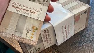 بعض فئات العملة السورية - أرشيفية