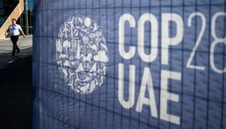 شعار COP28 - الفرنسية