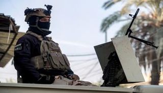أحد عناصر الشرطة العراقية - أ ف ب