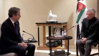 العاهل الأردني الملك عبدالله الثاني خلال لقاء له مع بلينكن