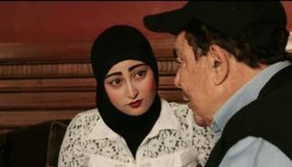 الراحل سمير صبري مع الصحفية هبة شوقي